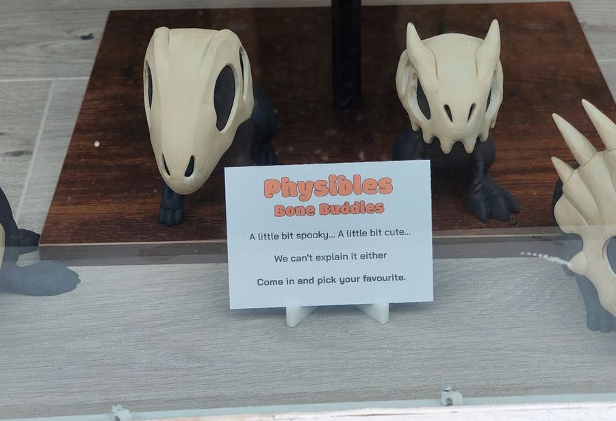 Bone Buddies skull figures in the shop window